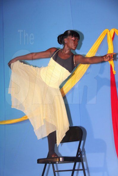 Anthony Minott/Freelance Photographer
Gritania Palmer dances solo effort entitled: Free, to the music of Rise again, during the Portmore Dancers Theatre Company Season of Dance 2010, at the Portmore HEART Academy on Saturday, June 12, 2010. The season lasted for two days, Saturday, June 12, and Sunday, June 13.
