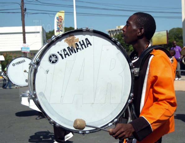 Peta-Gaye Clachar/Freelance Photographer
The Tivoli Gardens Drum Corp were in their elelments during the musical prelude at the Jamaica Library Service National Reading Fair at the Kingston and St. Andrew Parish Library on Saturday, November 28, 2009.