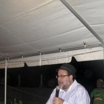 Mel Cooke<\n>Justice Minister, Senator Mark Golding, speaks at the Herb Curb on Saturday night at Rebel Salute 2oig, held at Grizzly's Plantation Cove, Priory, St Ann.