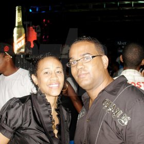 Contributed                                                                                                                                                                  This couple paused to take a picture before getting back to the fun at the Red Stripe X-Mas Kickoff party, House Party Edition, on Friday night at Old Coal Wharf, Port Royal.