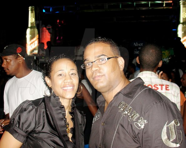 Contributed                                                                                                                                                                  This couple paused to take a picture before getting back to the fun at the Red Stripe X-Mas Kickoff party, House Party Edition, on Friday night at Old Coal Wharf, Port Royal.