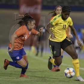 Jamaica's Khadija Shaw (right) on the offensive, tackled by Chile's Daniela Pardo in the International Womens friendly between Jamaica and Chile held at the National stadium on Thursday February 28, 2019