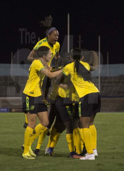 Marol Sweatman  of the Reggae Girlz  celebrates goal scored with teammates in the International Womens friendly against Chile held at the National stadium on Thursday February 28, 2019
