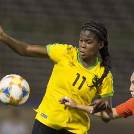 Gladstone Taylor/Multimedia Photo EditorJamaicas Khadija Shaw in a tussle with Chile's Camila Sáez (right) for possession of the ballin the Womens international friendly held at the national stadium on Thursday February 28, 2019.Reggae Girlz