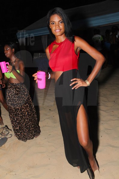 Anthony Minott/Freelance Photographer
This dashing beauty shows her best pose at Unleashed Entertainment's 'Reggae Luau' Beach Party held at Pearly Beach, Ocho  Rios, St Ann last Sunday.