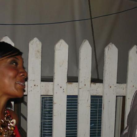 Contributed
Renee Wong Assistant Brand Manager Red Stripe chats with entertainer Protege during Reggae Sumfest International night 2 in Catherine Hall Montego Bay on Saturday July 23.