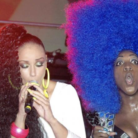 Photo by Adrian Frater
Mya (left) performs briefly with Spice during Reggae Sumfest's dancehall Night on Thursday at the Catherine Hall Entertainment Complex.