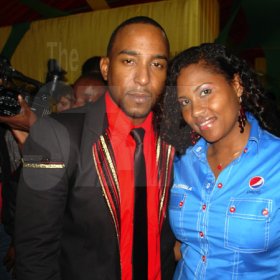 Contributed
Sumfest - Dancehall sensation Chan Dizzy wasn't being 'bad mind' when he cozied up to Pepsi's Cornelia Nathan during dancehall night at Reggae Sumfest on Thursday July 21 in Catherine Hall Montego Bay.