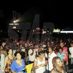 Photo by Sheena Gayle
A fair sized audience watches the performances at Reggae Sumfest on Friday's International Night 1 at the Catherine Hall Entertainment Complex in Montego Bay.