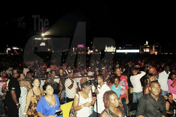 Photo by Sheena Gayle
A fair sized audience watches the performances at Reggae Sumfest on Friday's International Night 1 at the Catherine Hall Entertainment Complex in Montego Bay.