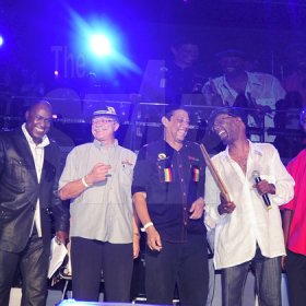 Photo by Sheena Gayle
From left: Radio host Richie B, along with Robert Russell and Johnny Gourzong the organisers of the annual Regge Sumfest, Beres Hammond and Walter Crooks are all smiles. Beres, was, just moments before, presented with a plaques for outstanding achievement in music.