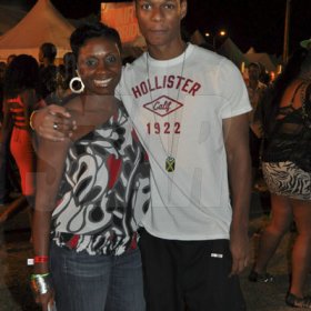 Janet Silvera/Staff Reporter
Sumfest - Olympian Juliet Cuthbert and her son Troy Ferguson pose for The Gleaner's camera at Reggae Sumfest 2K11 at Catherine Hall in Montego Bay last Friday night