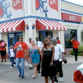 Winston Sill / Freelance Photographer
                                                                                 The gang has arrived!                                                                                                                                                                                                                                                                                                                                                                                                                                                                                                                 Digicel Rising Star final three performs on KFC concert and treat for children from places of safety, held at KFC, Portmore Mall on Saturday August 29, 2009.