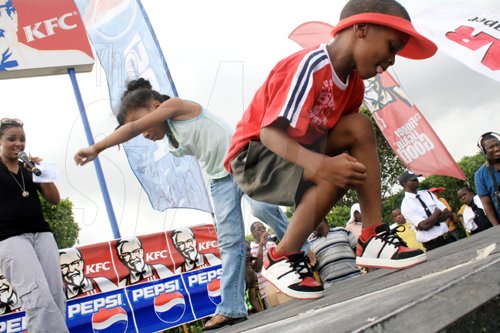 Anthony Minott/Freelance Photographer
Kids participating in a dance-off during the KFC-sponsored Digicel Rising Stars road show at the Portmore Mall, St. Catherine, last Saturday.