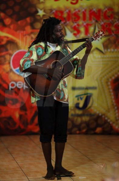 This-rastaman-brought-his-guitar-but-not-much-talent