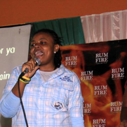 Anthony Minott/Freelance Photographer
Nastassie (left), and Patrice offered some laugh to patrons with their version of hit tune Grenade during RumFire sponsored Miles Karaoke at the Portmore Mall, on Saturday, July 14, 2012.