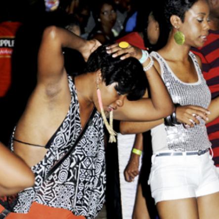 Winston Sill / Freelance Photographer
                                                                                 Patrons having a good time at Appleton Rum Punch.                                                                                                                                                                                                                                                                            Party, held at Liguanea Club, New Kingston on Sunday night June 26, 2011.