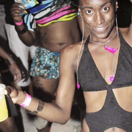 Anthony Minott/Freelance Photographer
She really 'wine up' herself during RumBar Chug It Sugarman's Beach, Hellshire, Portmore, St Catherine, Sunday, June 10, 2012.