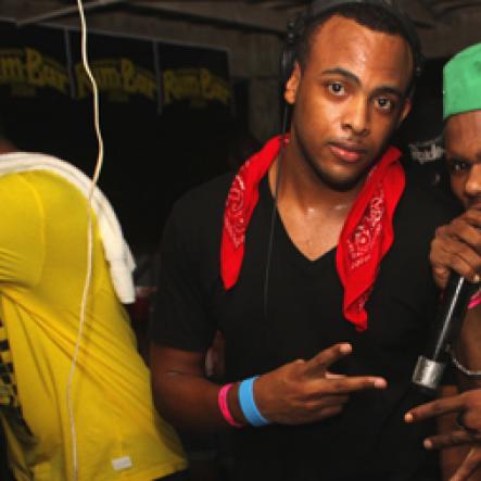 Anthony Minott/Freelance Photographer
Disc jocks, JR (left), and Karyzma create a buzz in the crowd with timely tunes during Rumbar Chug it Sugarman's Beach, Hellshire in Portmore, St Catherine on Sunday, September 16, 2012.