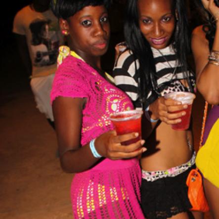 Anthony Minott/Freelance Photographer
These girls gear up to party on arrival during Rumbar Chug it Sugarman's Beach, Hellshire in Portmore, St Catherine on Sunday, September 16, 2012.