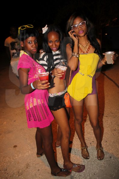 Anthony Minott/Freelance Photographer
These girls gear up to party on arrival during Rumbar Chug it Sugarman's Beach, Hellshire in Portmore, St Catherine on Sunday, September 16, 2012.