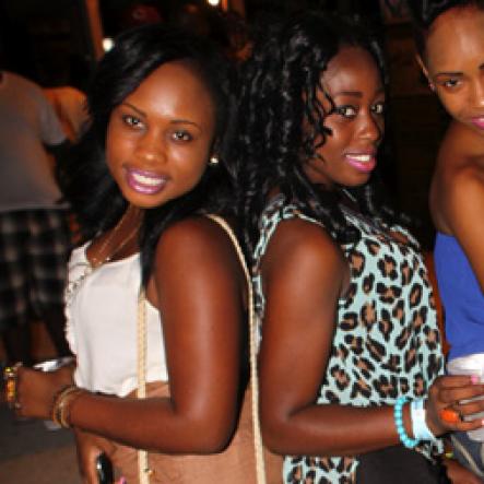 Anthony Minott/Freelance Photographer 
These honeys pose for a photo during Rumbar Chug it Sugarman's Beach, Hellshire in Portmore, St Catherine on Sunday, September 16, 2012.