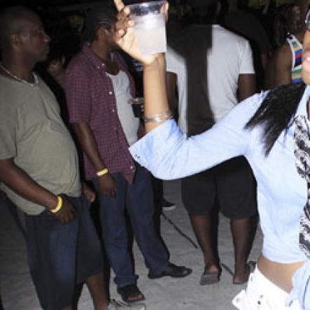 Anthony Minott/Freelance Photographer
Kerry, has beauty and style as she soaks up the attention during Rumbar Chug it at Sugarman's Beach, Heroes Sunday, October 14, 2012
