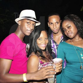 Partygoers pose for the camera as they enjoyed the vibe during Rumbar Chug it at Aquasol Theme Park in Montego Bay, St James. Over 17,000 patrons attended the party.