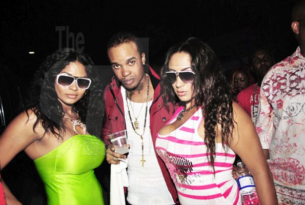 This man is lucky to have two sexy divas by his side. They were apart of the party series Rumbar Chug it at Aquasol Theme Park in Montego Bay, St James. Over 17,000 patrons attended the party.