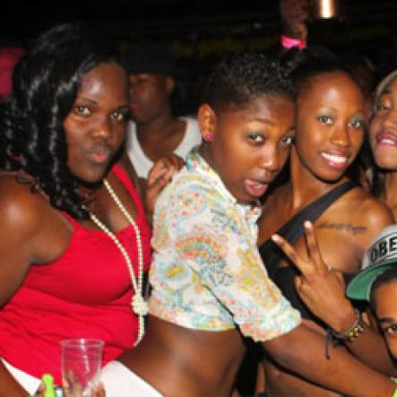 Anthony Minott/Freelance Photographer
The young people were out in their numbers, here a group take a photo opt during Chug it...the Soca Edition at Sugar Man's Beach, Hellshire, Portmore, St Catherine on Sunday, March 18, 2012. Over 8,000 patrons, mainly youngsters came to party.