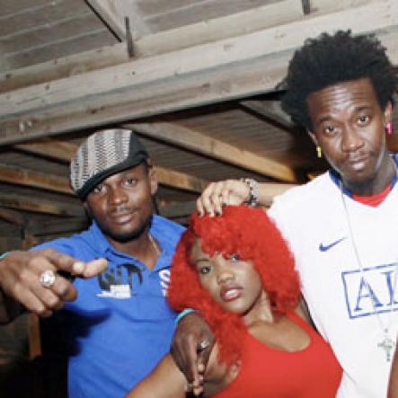 Anthony Minott/Freelance Photographer
DJ Chi Ching Ching (second right), and artiste Cold Ice pose with two sexy divas during Chug it...the Soca Edition at Sugar Man's Beach, Hellshire, Portmore, St Catherine on Sunday, March 18, 2012. Over 8,000 patrons, mainly youngsters attended the party.