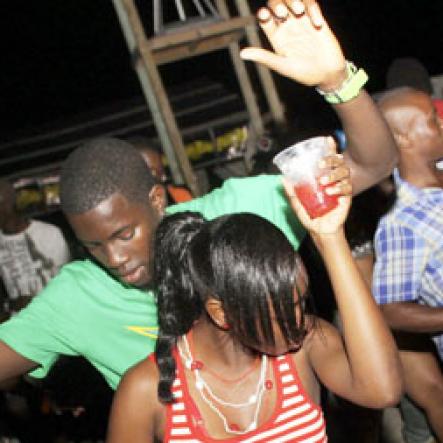 Anthony Minott/Freelance Photographer
These patrons getting down to some serious business during Chug it...the Soca Edition at Sugar Man's Beach, Hellshire, Portmore, St Catherine on Sunday, March 18, 2012. Over 8,000 patrons, mainly youngsters attended the party.