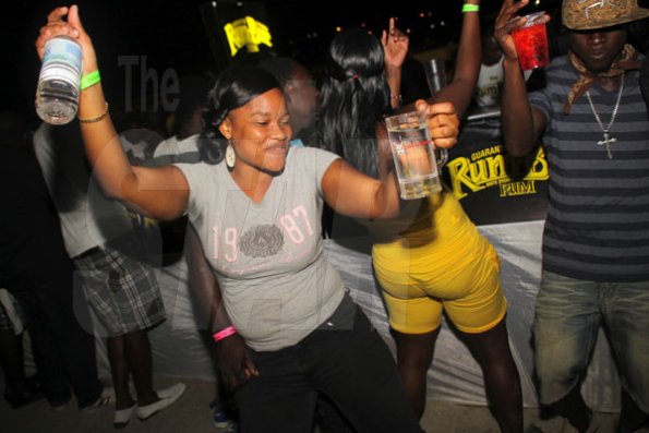 Anthony Minott/Freelance Photographer
She was feeling the party vibes during Chug it...the Soca Edition at Sugar Man's Beach, Hellshire, Portmore, St Catherine on Sunday, March 18, 2012. Over 8,000 patrons, mainly youngsters attended the party.