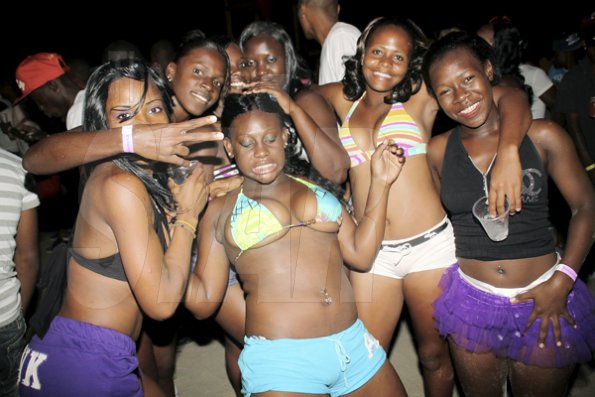 Anthony Minott/Freelance Photographer
The heat of the party got to these girls during RumBar Chug it held at Sugarman's Beach, Hellshire, Portmore, St Catherine on Sunday, April 8, 2012. Despite a heavy downpour in the evening hours over 8,000 patrons still made the trek to the award-winning party series.