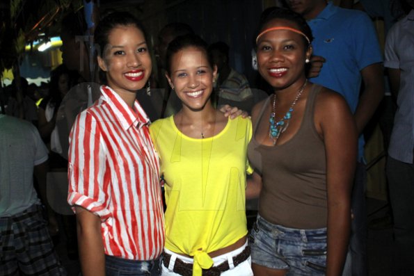 Anthoony Minott/Freelance Photographer
These beauties were among the crowd that showed a strong support during RumBar Container Summer Party Series at Container Satdazs headquarters, Regent Street, Denham Town, in West Kingston on Saturday, July 14, 2012.