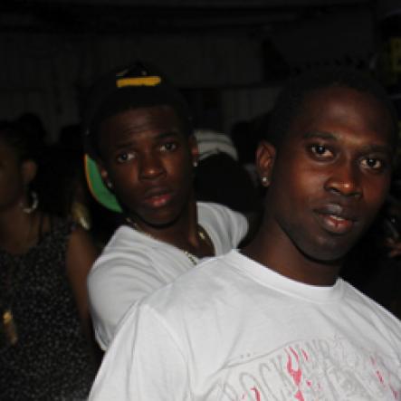 Anthoony Minott/Freelance Photographe
These two enjoying the RumBar Rum mixes during RumBar Container Summer Party Series at Container Satdazs headquarters, Regent Street, Denham Town, in West Kingston on Saturday, July 14, 2012.