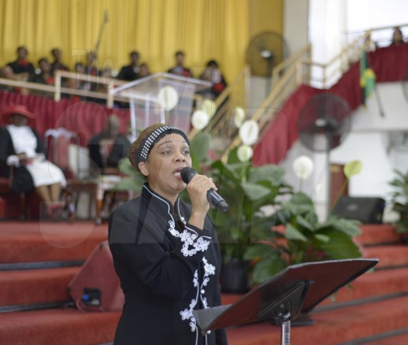 Gladstone Taylor/ Photographer

Sandra Morris-Allen (aunt in law) pays tribute in the form of a song

funeral service for the life of Annmarie Elliott-Nesbeth held at the new life assembly of God in kingston on saturday march 12, 2016