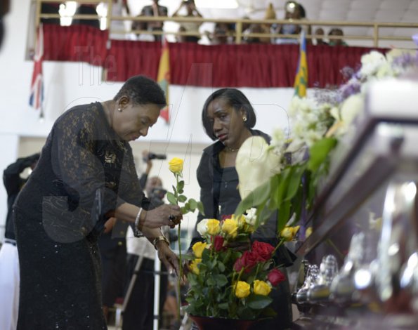 Gladstone Taylor/ Photographer

Oliva Grange Minister of Entertainment Sports, Culture and Gender affairs

funeral service for the life of Annmarie Elliott-Nesbeth held at the new life assembly of God in kingston on saturday march 12, 2016