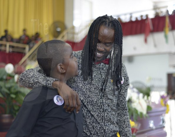 Gladstone Taylor/ Photographer

Sakani Nesbeth (son) and Greg Nesbeth (husband)

funeral service for the life of Annmarie Elliott-Nesbeth held at the new life assembly of God in kingston on saturday march 12, 2016