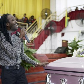 Gladstone Taylor/ Photographer<\n>Greg Nesbeth pays tribute to his wife Annmarie Elliott-Nesbeth<\n>funeral service for the life of Annmarie Elliott-Nesbeth held at the new life assembly of God in kingston on saturday march 12, 2016