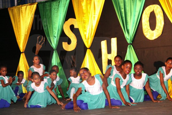 Anthony Minott/Freelance Photographer
Portmore Missionaary church junior dancers in performance during Portmore Missionary church dance Ministry's  performance show under the theme: 'Shout' on Portmore Missionary church grounds, on George Lee Boulevard in Portmore, St Catherine on Sunday, October 18, 2009.