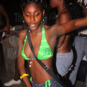 Anthony Minott/Freelance Photographer
TEK IT TO DEM: She was really in her element during 'Skintasy Chic', wet & wild beach party held at the Boardwalk Beach in hellshire on Sunday, July 25, 2010.
