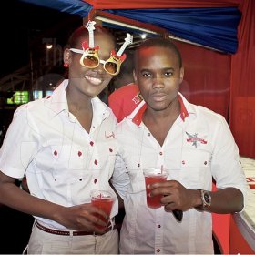 Contributed                                                                                                                                                                  Smirnoff brand manager, Safia Cooper (left) and Kamal Powell were taking in the most querky elements of the Smirnoff Nightlife Exchange project launch in Half Way Tree recently.