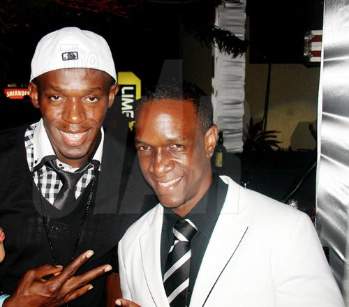 Contributed
The world's fastest man, Usain Bolt slowed things down to hang with Smirnoff Xclusive promoter, Phillip?'PP' Palmer during the event in Cherry Gardens.

************************************************************************* on Friday December 31st.