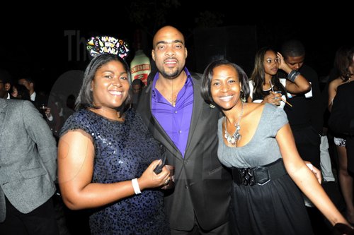 Rudolph Brown/Photographer
From left Devena Reid, Sean Reid and Tamara Smith at Smirnoff Exclusive at Chateau Xclusive, 3 Cherry Drive, Cherry Gardens on New Years Eve Friday, December 31-2010