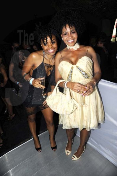 Rudolph Brown/Photographer
Sandra Gregory, (right) with her daughter Nicole Francis at Smirnoff Exclusive at Chateau Xclusive, 3 Cherry Drive, Cherry Gardens on New Years Eve Friday, December 31-2010