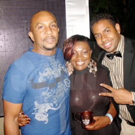 Contributed
DJ Colin Hinds (left) and 3rd Dimension's Kamal Bankay stop for a quick photo with Smirnoff brand manager, Marsha Lumley during Smirnoff Xclusive held on Friday December 31 in Cherry Gardens.