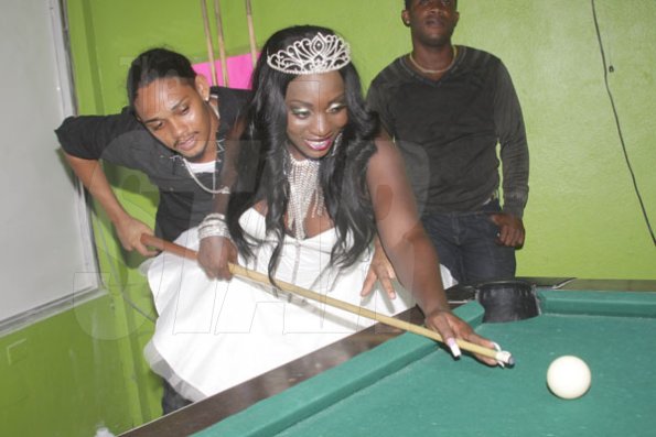 Anthony Minott/Freelance Photographer
DJ Spice plays a game of pool during her birthday bash at Bayside, Portmore, St Catherine on Friday, August 6, 2010.