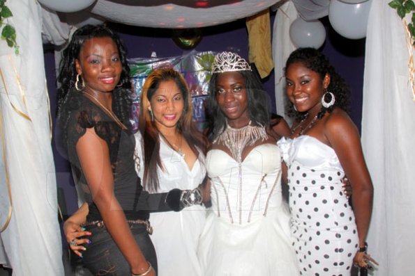 Anthony Minott/Freelance Photographer
DJ Spice pose with patrons during her birthday bash at Bayside, Portmore, St Catherine on Friday, August 6, 2010.