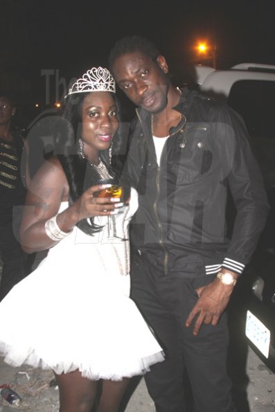 Anthony Minott/Freelance Photographer
Bounty Killer (right), pose with birthday girl, DJ Spice during her birthday bash at Bayside, Portmore, St Catherine on Friday, August 6, 2010.